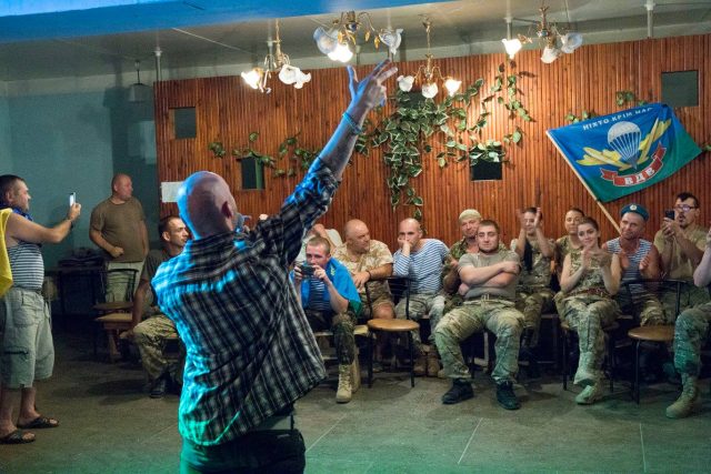 Frontline, April 5, 2015. Volunteer artists from Kharkiv entertain the Myrotvorets (Peacebuiler) batalion. Photo by Leonid Logvinenko