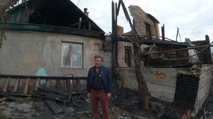 Kharkiv. Vyacheslav Zubenko, father of the hero of the Heavenly Hundred, near the broken house on Susanina Street. Photo was taken on Sep 06, 2022 by Yevhen Tytarenko.